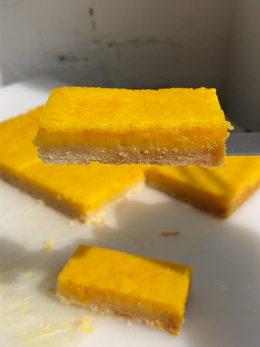 kumquat curd bar being held