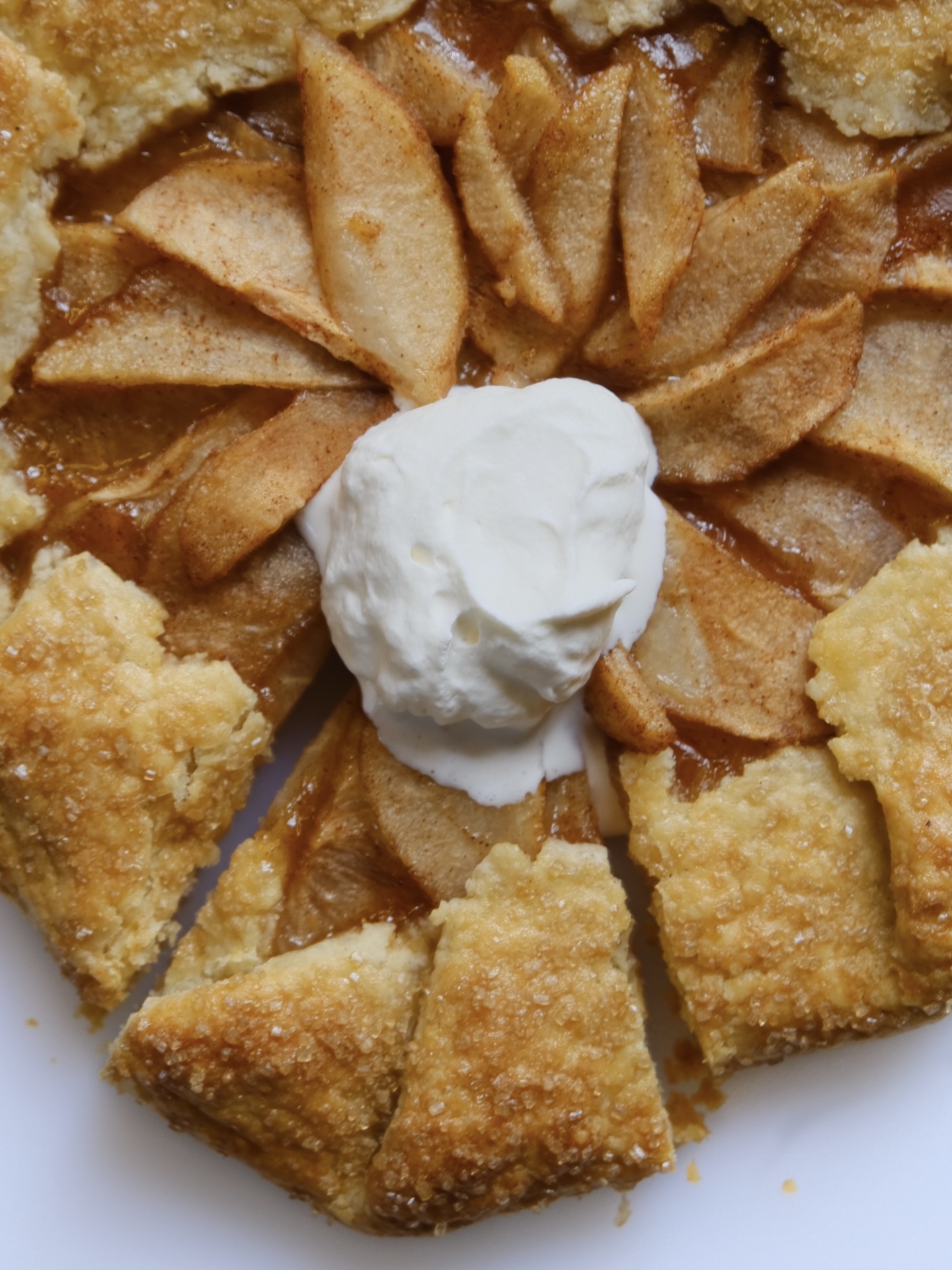 ginger pear galette on a white background