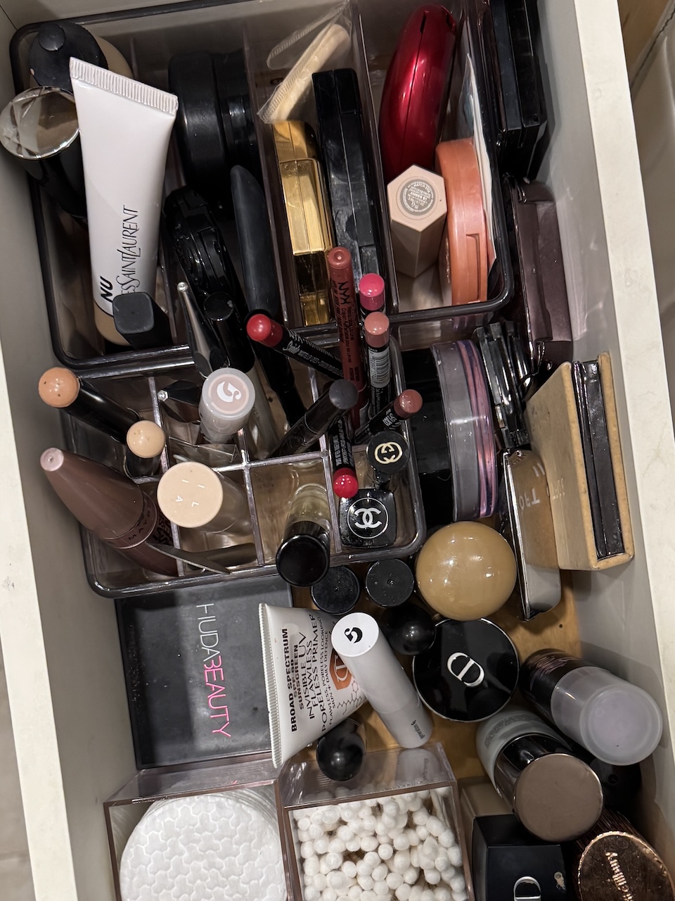 drawer filled with various makeup products